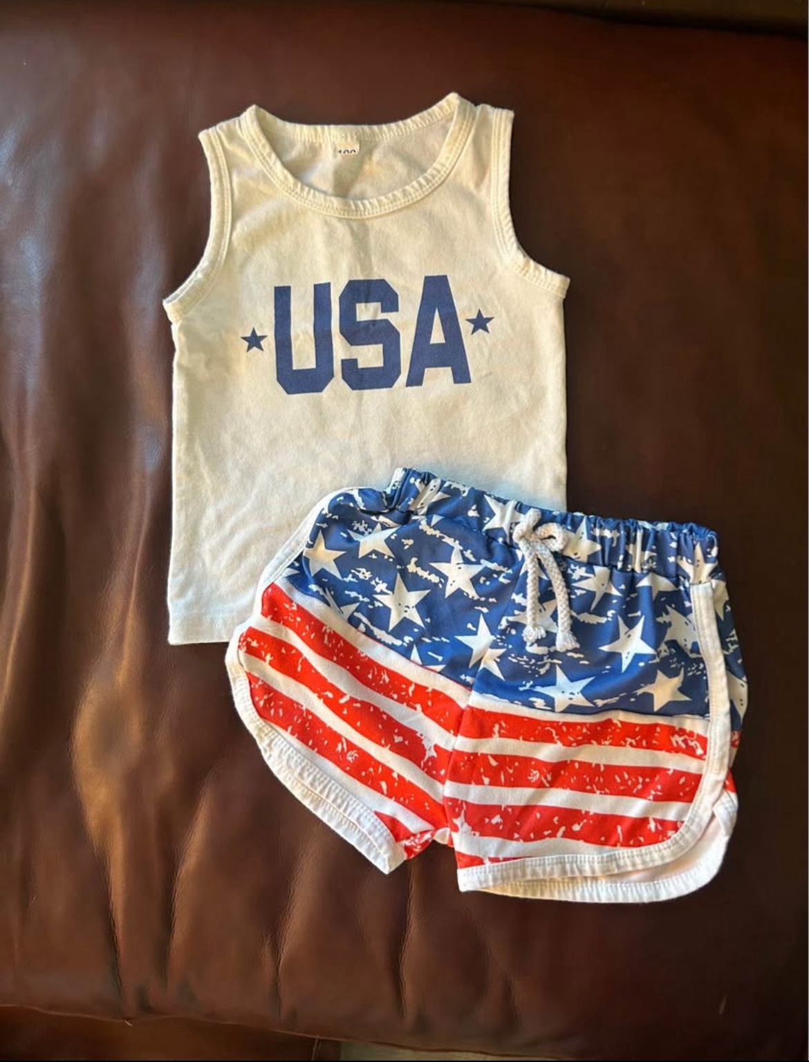 2 Pairs - USA & Shark outfits Size: 18 & 24 M