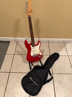 Red Squier Electric Guitar with Gig Bag