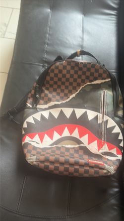 Spray ground backpack