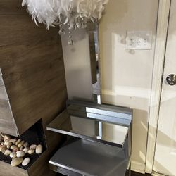 side table with fur hanging chandelier