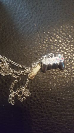 Silver PlayStation pendant necklace