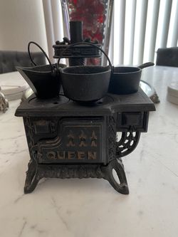 Vintage Queen Miniature Cast Iron Stove With