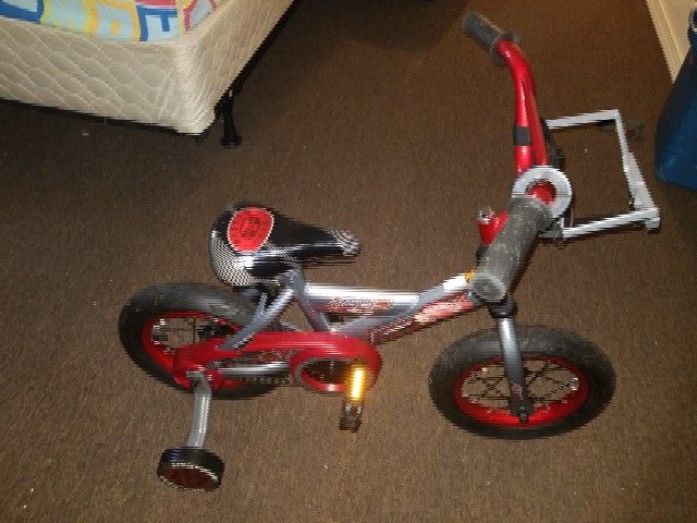 Huffy car's bike new never used still has tags on it