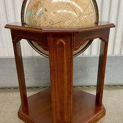 Vintage tan Imperial world globe w/ solid wood encased stand
