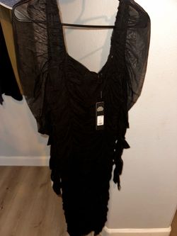 Ruched gown with mesh sleeves