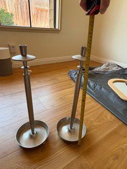 2 silver candle stands
