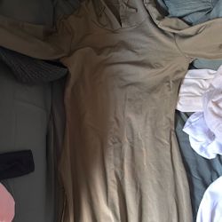 Woman’s long sleeve floor length tight fitting dress