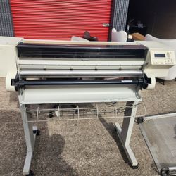 Large-format HP DesignJet plotter (wide-format printer). It appears to be an older model, likely within the HP DesignJet 600, 650C, or 750C Plus serie