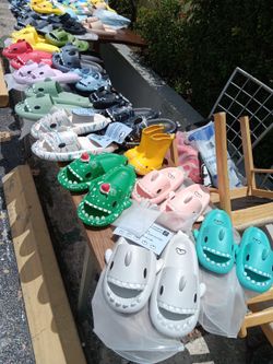 We got sharks we've got pandas we've got Tigers we've got watermelons we've got red blue pink purple anything you can imagine $5 a pair come one come
