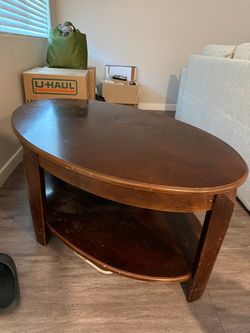 Oval Wood Coffee Table with Lower Shelf
