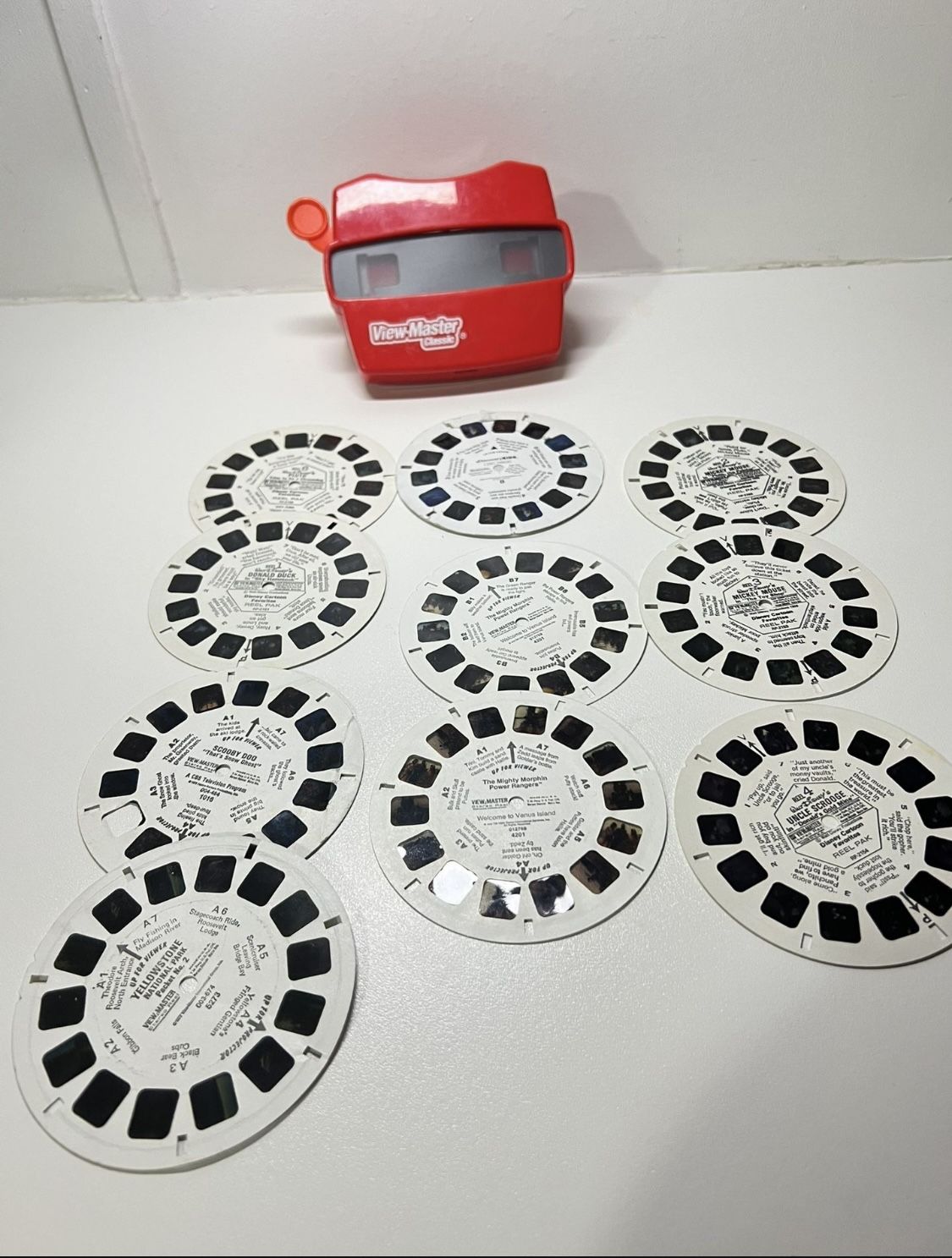 Vintage Red-Orange View-master Slide 3D Lot -YELLOWSTONE NATIONAL PARK -DONALD DUCK -@iscoveryKIDS. -The Mighty Morphin -Power Rangersâ„¢ -MICKEY MOUSE