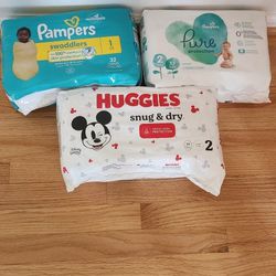 98 Pampers and Huggies Diapers Size 1 and 2 Factory Sealed