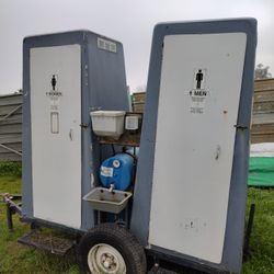 Portable Restroom, Tractor Tires,Home Made Trailer.