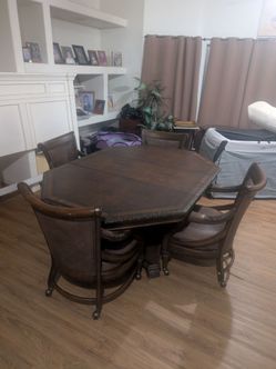 Brittany Octagon Dining Table Set with 4 Rolling Swivel Chairs
