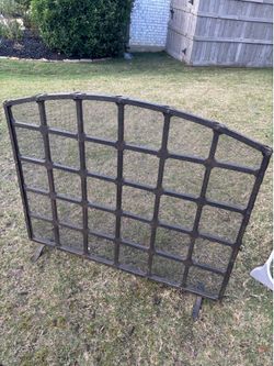 Selling a beautiful iron fireplace screen