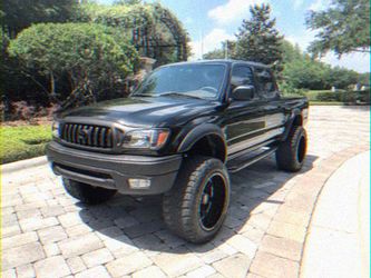 Toyota Tacoma Lifted Black Pickup Truck