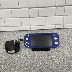 Nintendo Switch Lite 32 gb no offers or trades please!!