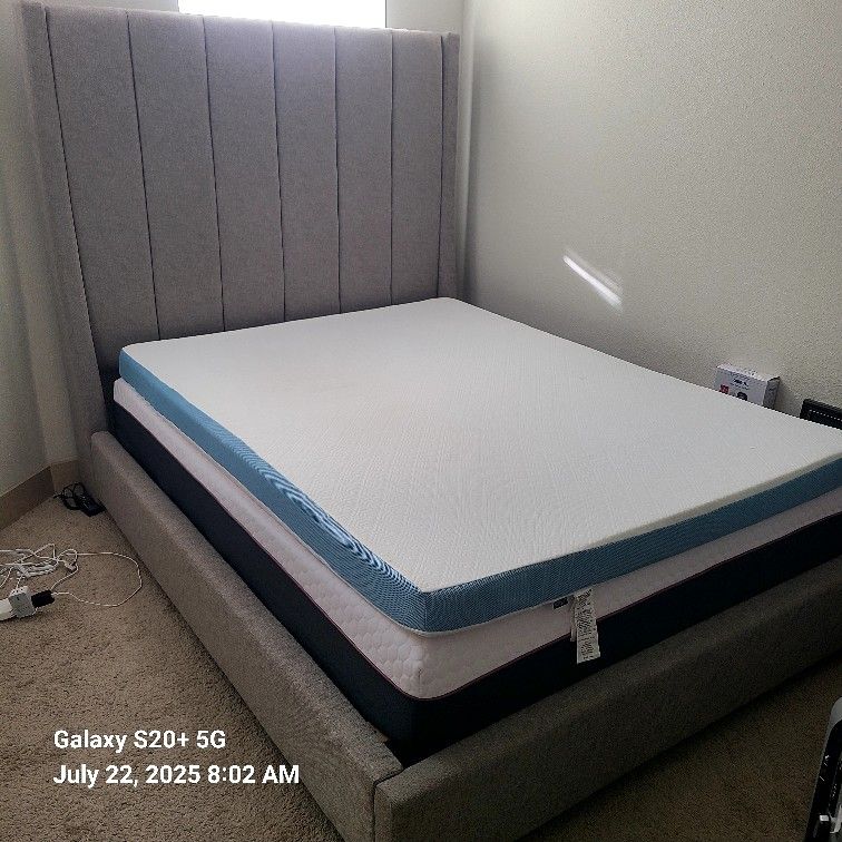 Grey upholstered Platform bed frame 
with a mattress & topper