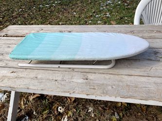 Table top ironing board with cover