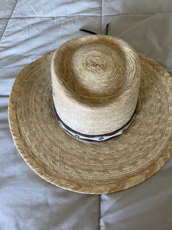 Straw hat with leather banding on brim