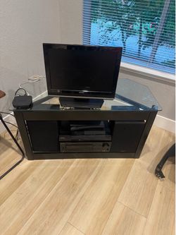Black glass Tv stand