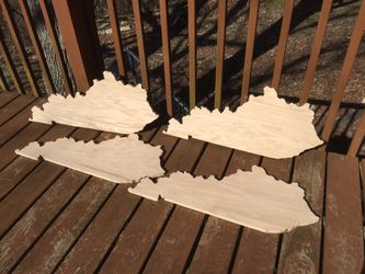 Hand cut Kentucky state signs ready for paint or stain