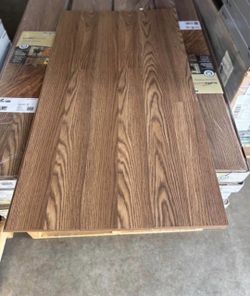 TrafficMaster Kellum Valley Oak Gunstock Brown 7 mm T x 8 in. W Laminate Flooring Planks