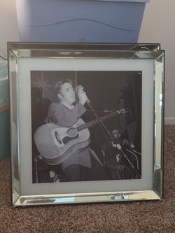 Iconic elvis Presley pictures in glass reflective frame