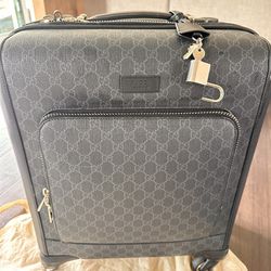Gucci Supreme ; Gran Turismo Suitcase