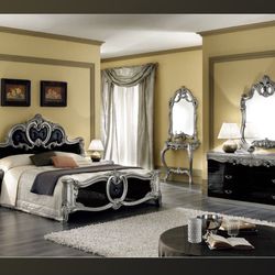 whole bedroom set. Queen bed, 2 nightstands and vanity 6 drawer dresser with mirror.