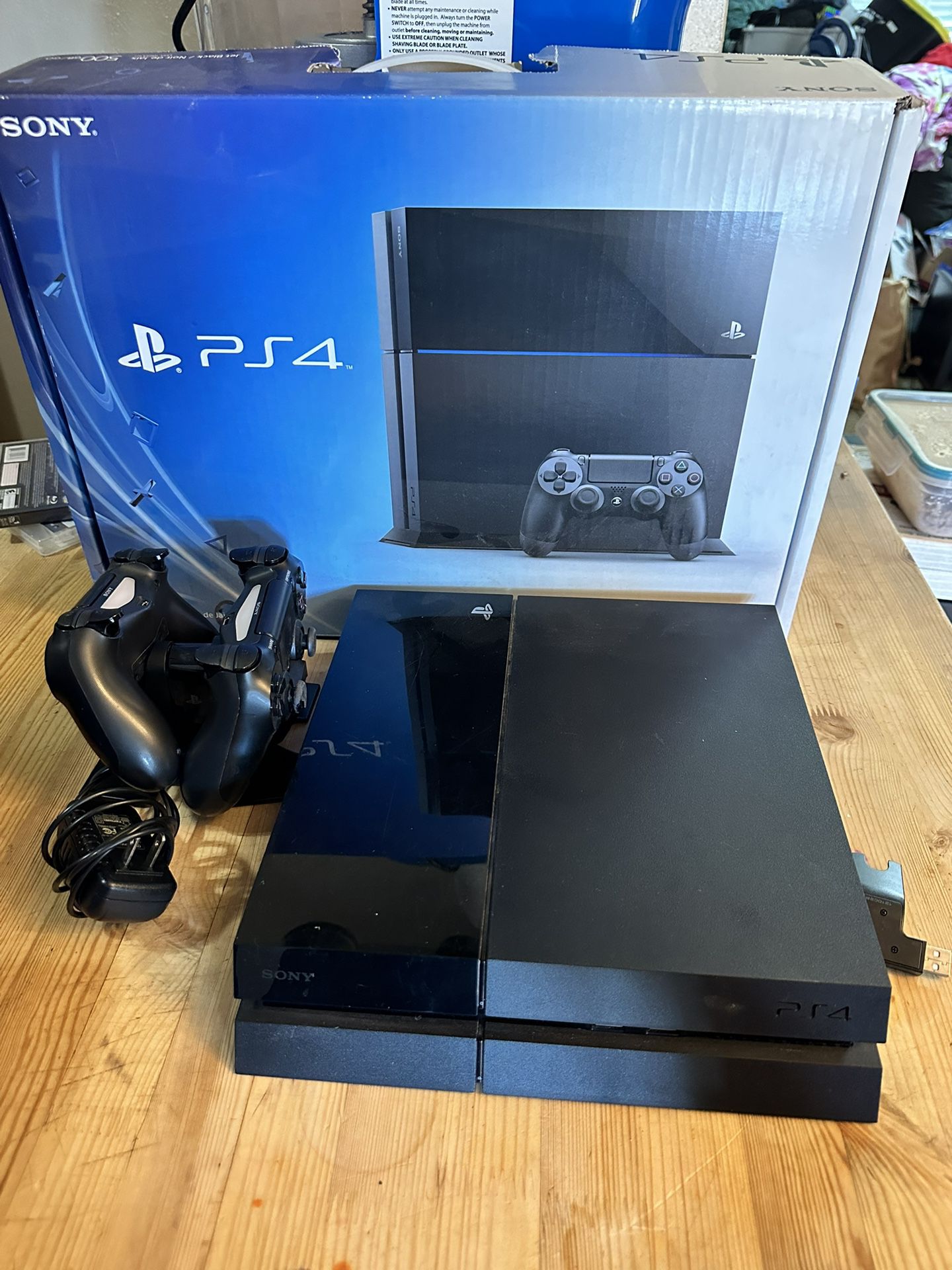PS4 In Original Box With 2 Controllers And 31 Games 
