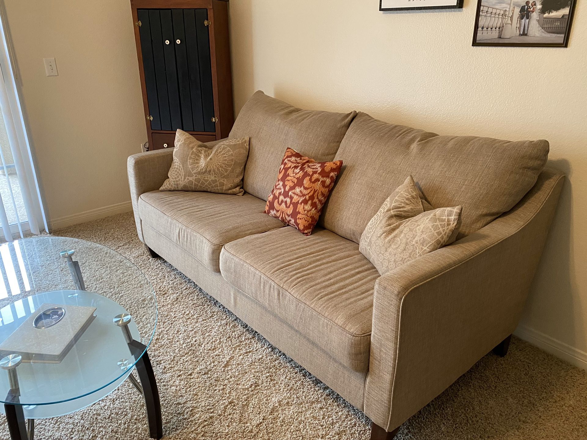Living room furniture: Couch and Glass Coffee Table