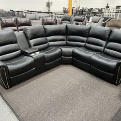 New Reclining Sectional .  Black Leather .  111” X 98”.  Free Delivery !