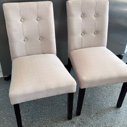 Two Chairs, Black Legs