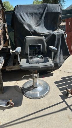 Barber shop chair w/ clippers