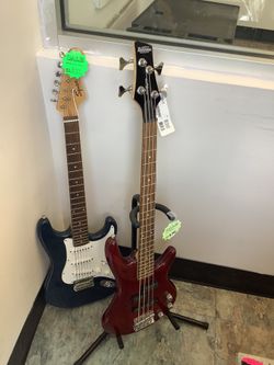 Guitar And Bass (Rj Cash Pawnshop 2505 NW 183rd St)