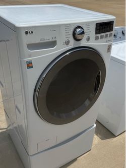 Front load LG washer high efficiency with pedestal works excellent extra for delivery same day delivery and installation available