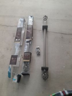 Curtain  rod 24 to 48 inches Brand new 2 pcs pick up only $25.00 for 2 pcs