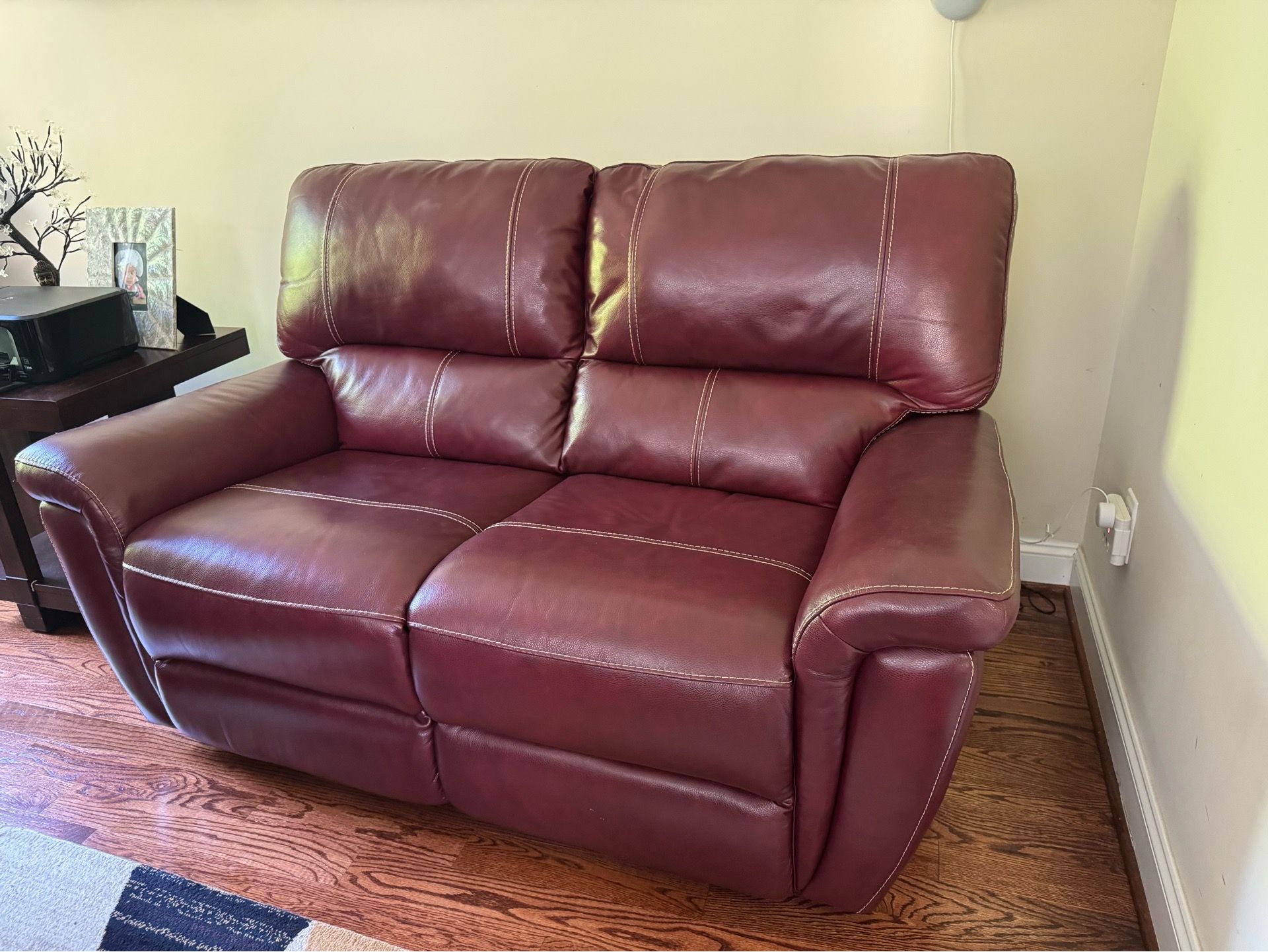 Burgundy / wine red leather love seat sofa