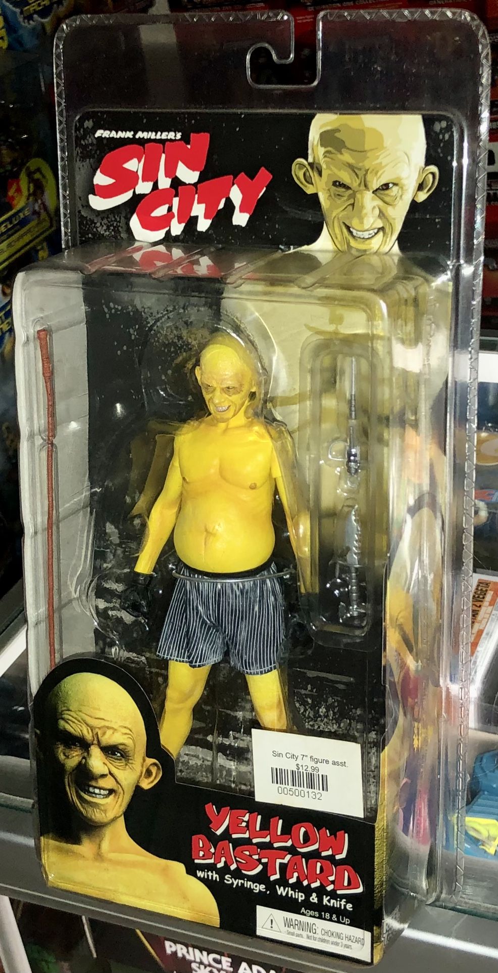 Neca Frank Miller’s Sin City Movie Series 1 Smiling Ethan Roark Jr. Yellow Bastard (Nick Stahl) with Syringe, Whip and Knife