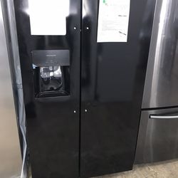 Frigidaire side-by-side in black with an icemaker