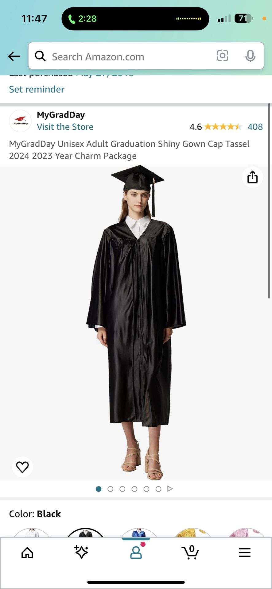 Black Cap Gown and Tassle (doesn’t say graduating year)