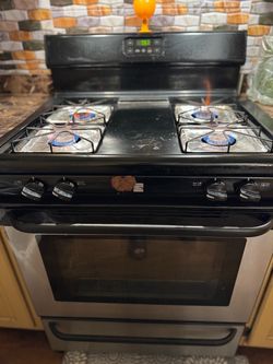 Kenmore stainless steel gas stove and range hood
