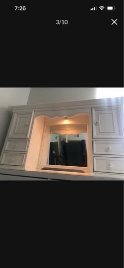 Vanity with lighted mirror