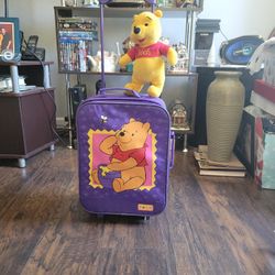 WINNIE THE POOH GIRLS ROLLING SUITCASE (POOH BEAR INCLUDED) $50.00