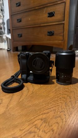 Sony a6000 Vertical Grip Mirrorless Camera with 55-210 Zoom Lens