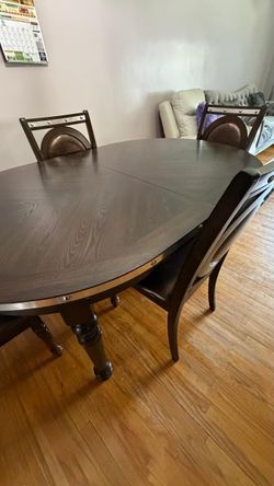 Dark Wood Oval Dining Table with 4 Chairs