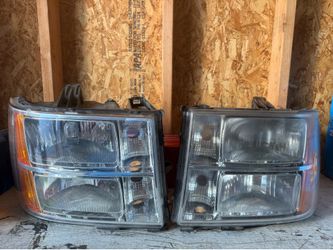 07-11 GMC 1500 OEM front Headlights