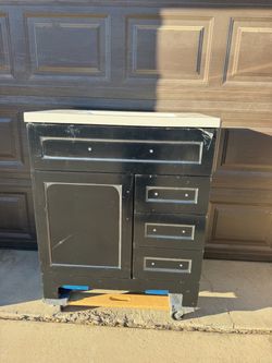 BLACK 30” BATHROOM VANITY (plastic protector in front)