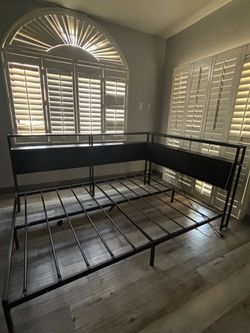 Queen size bed with charging port.